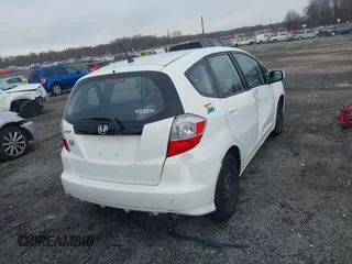 2013 Honda Fit with VIN JHMGE8H39DC005052, listed as a IAAI auction lot 41008236 with 124,874 mi miles. Bid and sale history available at carsss.com. Image 16.