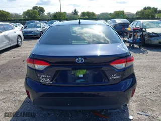 2024 Toyota Corolla Hybrid LE with VIN JTDBCMFE4RJ021466, listed as a IAAI auction lot 41976149 with 21,965 mi miles. Bid and sale history available at carsss.com. Image 16.