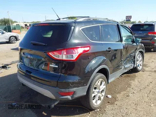 2013 Ford Escape SE with VIN 1FMCU0GX3DUA53113, listed as a IAAI auction lot 40497958 with 132,367 mi miles and . Bid and sale history available at carsss.com. Image 4.