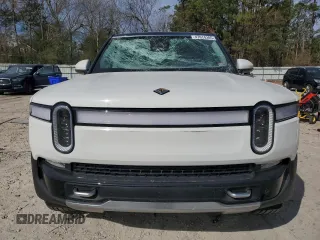 2024 Rivian R1S Adventure z VIN 7PDSGABA1RN030813, wystawiony jako Copart lot #47614385 z przebiegiem 16 946 mil mil oraz Szkody całkowita. Historia ofert i sprzedaży dostępna na DreamBid. Obrazek 5.