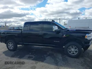 2024 Ram 2500 Laramie with VIN 3C6UR5NL2RG161490, listed as a IAAI auction lot 41688136 with 10,597 mi miles and . Bid and sale history available at DreamBid. Image 13.