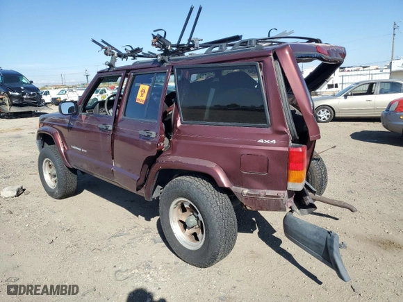 2000 Jeep Cherokee Police with VIN 1J4FF48S3YL141168, listed as a Copart auction lot 71612494 with NaN miles and Salvage Title. Bid and sale history available at carsss.com. Image 2.