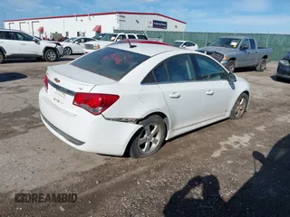2014 Chevrolet Cruze 1LT z VIN 1G1PC5SB5E7190497, wystawiony jako IAAI lot #41399147 z przebiegiem 159 724 mil mil oraz . Historia ofert i sprzedaży dostępna na DreamBid. Obrazek 4.