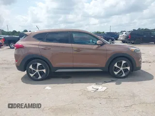 2017 Hyundai Tucson Value with VIN KM8J33A27HU430198, listed as a IAAI auction lot 42104369 with 163,929 mi miles and . Bid and sale history available at DreamBid. Image 13.