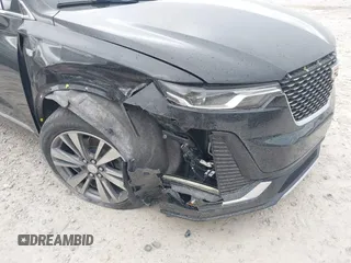 2021 Cadillac XT6 Premium Luxury with VIN 1GYKPDRS2MZ141406, listed as a IAAI auction lot 42014495 with 62,929 mi miles and . Bid and sale history available at DreamBid. Image 6.
