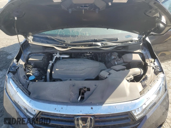 2023 Honda Odyssey Elite с VIN 5FNRL6H97PB071003, выставлен на аукционе Copart как лот 43641965 с пробегом Не указан миль и Списание • Salvage title. История ставок и продаж доступна на DreamBid. Изображение 12.