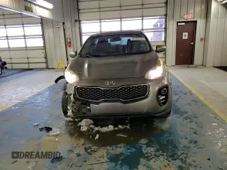 2017 Kia Sportage LX z VIN KNDPMCAC4H7127477, wystawiony jako Copart lot #88499105 z przebiegiem 161 401 mil mil oraz Szkoda całkowita • Salvage title. Historia ofert i sprzedaży dostępna na DreamBid. Obrazek 12.