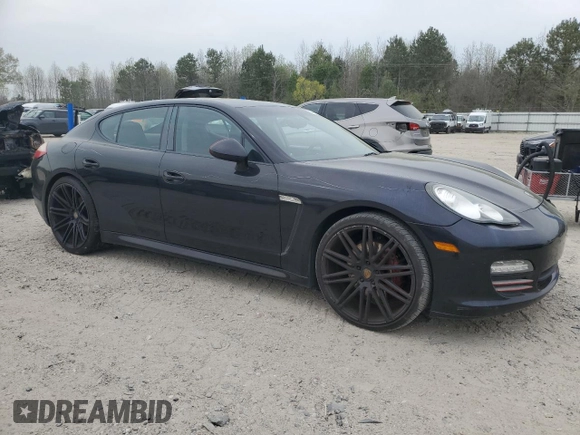 2011 Porsche Panamera z VIN WP0AA2A77BL013970, wystawiony jako Copart lot #52149445 z przebiegiem 165 926 mil mil oraz Czysty tytuł • Clean title. Historia ofert i sprzedaży dostępna na DreamBid. Obrazek 4.