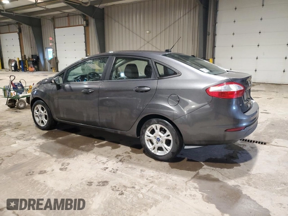 2015 Ford Fiesta SE with VIN 3FADP4BJ5FM123167, listed as a Copart auction lot 52576405 with 104,243 mi miles and Salvage Title. Bid and sale history available at DreamBid. Image 2.
