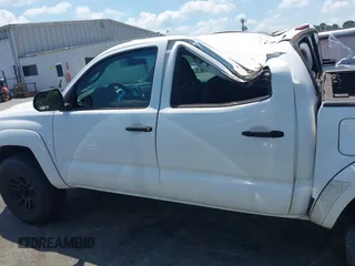 2015 Toyota Tacoma with VIN 3TMLU4EN1FM195626, listed as a IAAI auction lot 42571649 with 135,699 mi miles and . Bid and sale history available at DreamBid. Image 14.