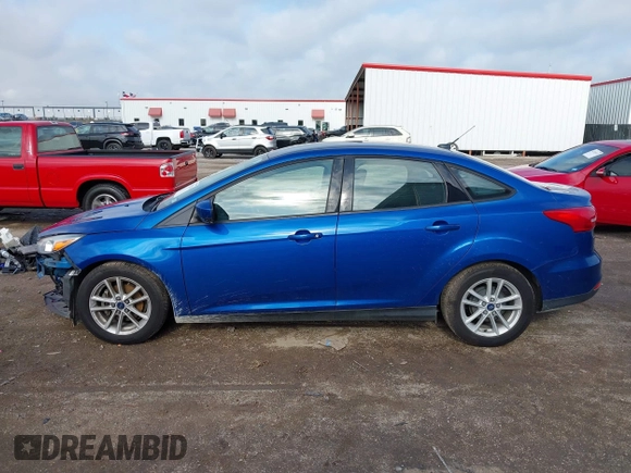 2018 Ford Focus SE z VIN 1FADP3F2XJL293337, wystawiony jako IAAI lot #42121294 z przebiegiem 71 241 mil mil oraz . Historia ofert i sprzedaży dostępna na DreamBid. Obrazek 14.