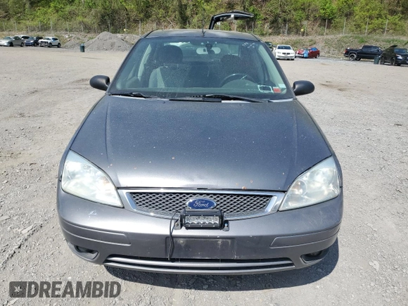 2007 Ford Focus S z VIN 1FAHP34N57W145697, wystawiony jako Copart lot #55335235 z przebiegiem 228 416 mil mil oraz Nie do naprawy • Non repairable. Historia ofert i sprzedaży dostępna na DreamBid. Obrazek 5.
