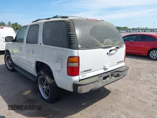 2003 Chevrolet Tahoe LS with VIN 1GNEC13ZX3R281468, listed as a IAAI auction lot 41911693 with 149,387 mi miles and . Bid and sale history available at DreamBid. Image 3.