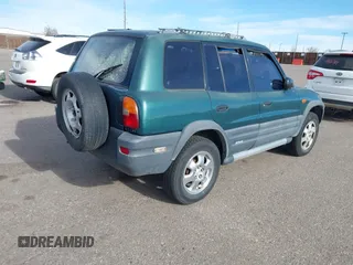 1997 Toyota RAV4 with VIN JT3HP10V2V0147285, listed as a IAAI auction lot 41856796 with 303,535 mi miles and . Bid and sale history available at DreamBid. Image 4.