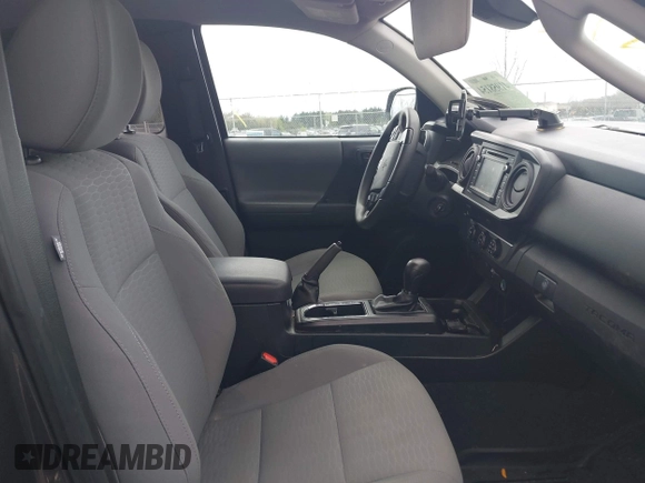 2019 Toyota Tacoma SR with VIN 5TFRX5GN0KX139329, listed as a IAAI auction lot 41958154 with 72,700 mi miles and . Bid and sale history available at DreamBid. Image 5.