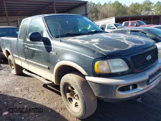 1997 Ford F-150 XL with VIN 1FTEX18L9VNC35190, listed as a IAAI auction lot 41451204 with 263,305 mi miles. Bid and sale history available at carsss.com. Image 1.