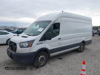 2020 Ford Transit Cargo with VIN 1FTBR3X81LKB42992, listed as a IAAI auction lot 41363461 with 206,522 mi miles and . Bid and sale history available at carsss.com. Image 2.