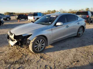 2015 Infiniti Q50 Premium with VIN JN1BV7AR9FM398295, listed as a Copart auction lot 86662494 with 103,756 mi miles and Salvage title. Bid and sale history available at DreamBid. Image 1.