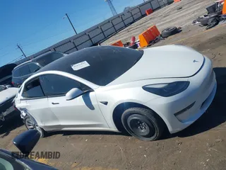 2021 Tesla Model 3 Long Range z VIN 5YJ3E1EB6MF902268, wystawiony jako IAAI lot #41837846 z przebiegiem 37 041 mil mil oraz . Historia ofert i sprzedaży dostępna na DreamBid. Obrazek 12.