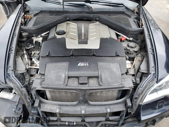 2013 BMW X5 M with VIN 5YMGY0C51DLL15660, listed as a Copart auction lot 84766244 with 113,007 mi miles and Salvage Title. Bid and sale history available at carsss.com. Image 12.