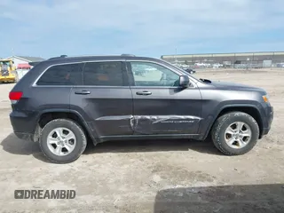 2015 Jeep Grand Cherokee Laredo with VIN 1C4RJFAG6FC140581, listed as a IAAI auction lot 41869952 with 193,295 mi miles. Bid and sale history available at carsss.com. Image 13.