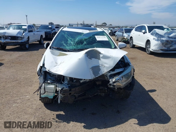 2014 Toyota Corolla L with VIN 5YFBURHE7EP049355, listed as a IAAI auction lot 42073330 with 129,605 mi miles and . Bid and sale history available at DreamBid. Image 13.