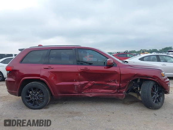 2018 Jeep Grand Cherokee Altitude with VIN 1C4RJEAGXJC281236, listed as a IAAI auction lot 42378899 with 102,276 mi miles and . Bid and sale history available at DreamBid. Image 13.