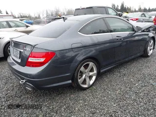 2014 Mercedes-Benz C-Class C 350 with VIN WDDGJ8JB8EG321184, listed as a IAAI auction lot 41069037 with 104,454 mi miles. Bid and sale history available at carsss.com. Image 4.