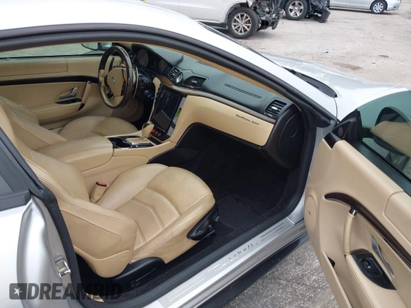 2013 Maserati GranTurismo Sport with VIN ZAM45VLA8D0072490, listed as a IAAI auction lot 42438872 with 84,214 mi miles and . Bid and sale history available at DreamBid. Image 5.