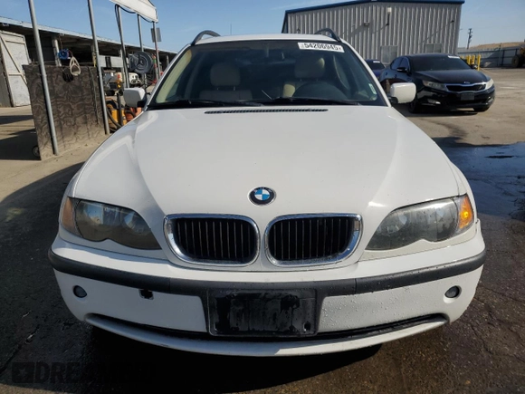 2003 BMW 3 Series 325i with VIN WBAEN33483PC12177, listed as a Copart auction lot 54206945 with 125,512 mi miles and Salvage Title. Bid and sale history available at DreamBid. Image 5.