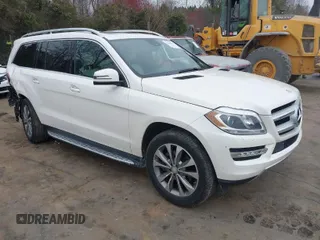 2016 Mercedes-Benz GL with VIN 4JGDF6EE7GA673861, listed as a IAAI auction lot 41803302 with 74,670 mi miles. Bid and sale history available at carsss.com. Image 1.