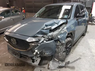 2021 Mazda CX-5 Touring with VIN JM3KFBCM5M0365725, listed as a IAAI auction lot 41411763 with 77,504 mi miles. Bid and sale history available at carsss.com. Image 19.