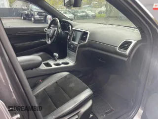 2015 Jeep Grand Cherokee Laredo with VIN 1C4RJFAGXFC233877, listed as a Copart auction lot 54858775 with 231,505 mi miles and Clean Title. Bid and sale history available at carsss.com. Image 5.