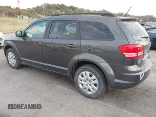2018 Dodge Journey SE with VIN 3C4PDCABXJT170150, listed as a IAAI auction lot 40715756 with 113,330 mi miles and . Bid and sale history available at DreamBid. Image 3.
