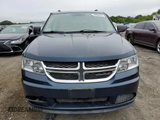 2014 Dodge Journey SE with VIN 3C4PDCAB2ET174067, listed as a Copart auction lot 60966025 with 189,091 mi miles and Clean title. Bid and sale history available at DreamBid. Image 5.