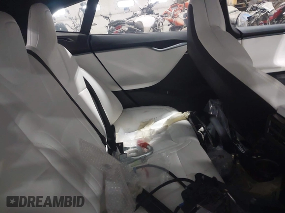 2018 Tesla Model S 75D with VIN 5YJSA1E24JF257817, listed as a IAAI auction lot 41960439 with 61,971 mi miles and . Bid and sale history available at DreamBid. Image 8.