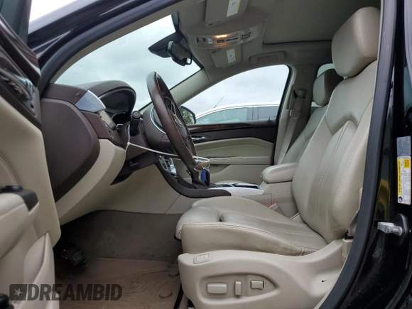 2014 Cadillac SRX Performance Collection with VIN 3GYFNFE33ES687941, listed as a Copart auction lot 57726675 with 164,059 mi miles and Clean title. Bid and sale history available at DreamBid. Image 7.