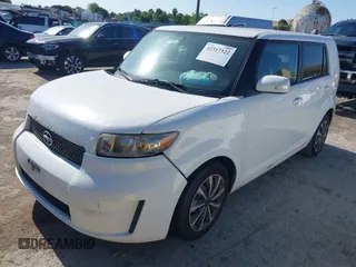 2009 Scion xB z VIN JTLKE50E091092077, wystawiony jako IAAI lot #42317322 z przebiegiem 150 513 mil mil oraz . Historia ofert i sprzedaży dostępna na DreamBid. Obrazek 2.