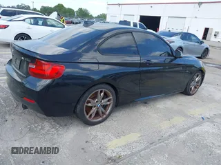 2014 BMW 2 Series M235i with VIN WBA1J7C50EVW84072, listed as a IAAI auction lot 41917841 with 102,745 mi miles and . Bid and sale history available at carsss.com. Image 4.