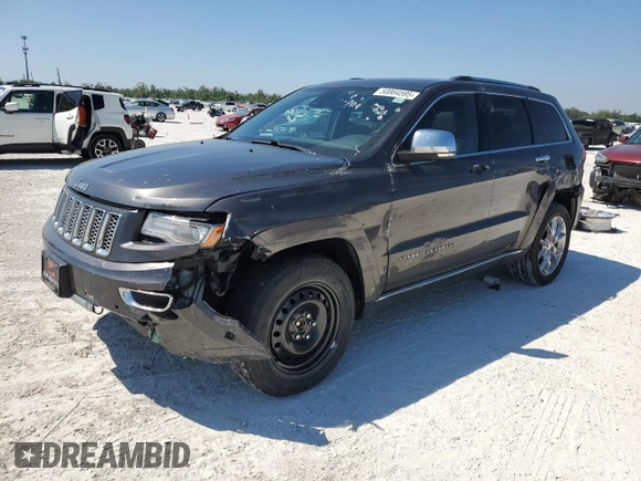 2014 Jeep Grand Cherokee Summit with VIN 1C4RJFJGXEC159438, listed as a Copart auction lot 50864595 with 134,558 mi miles and Salvage title. Bid and sale history available at DreamBid. Image 1.