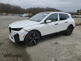 2025 BMW iX xDrive50 z VIN WB523CF09SCU44676, wystawiony jako Copart lot #47785405 z przebiegiem 18 mil mil oraz Tytuł czysty. Historia ofert i sprzedaży dostępna na DreamBid. Obrazek 1.