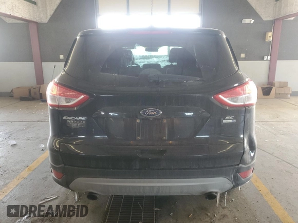 2016 Ford Escape SE with VIN 1FMCU9GX7GUB68189, listed as a Copart auction lot 45628525 with 84,689 mi miles and Salvage Title. Bid and sale history available at carsss.com. Image 6.