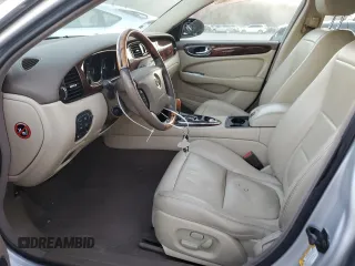 2005 Jaguar XJ with VIN SAJWA79C55SG37981, listed as a Copart auction lot 81142484 with 128,601 mi miles and Salvage Title. Bid and sale history available at carsss.com. Image 7.