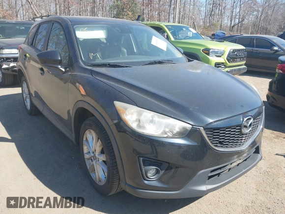 2014 Mazda CX-5 Grand Touring with VIN JM3KE4DY1E0339690, listed as a IAAI auction lot 41668780 with 216,825 mi miles. Bid and sale history available at carsss.com. Image 1.