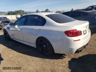 2015 BMW M5 with VIN WBSFV9C51FD594308, listed as a Copart auction lot 43259104 with 73,158 mi miles. Bid and sale history available at carsss.com. Image 2.
