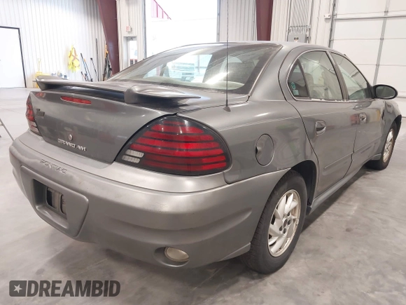 2004 Pontiac Grand Am SE1 with VIN 1G2NF52E74C256591, listed as a IAAI auction lot 41783877 with 181,610 mi miles. Bid and sale history available at carsss.com. Image 4.