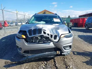 2019 Jeep Cherokee Latitude Plus with VIN 1C4PJMLB0KD320947, listed as a IAAI auction lot 41225801 with 64,537 mi miles and . Bid and sale history available at DreamBid. Image 11.