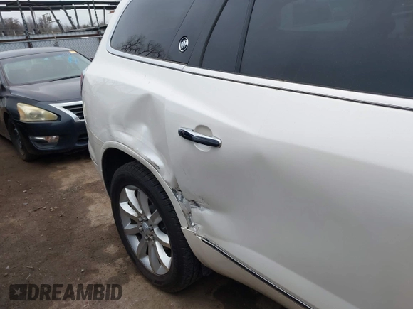 2014 Buick Enclave Premium with VIN 5GAKVCKDXEJ243216, listed as a IAAI auction lot 41709325 with 76,319 mi miles and . Bid and sale history available at DreamBid. Image 6.