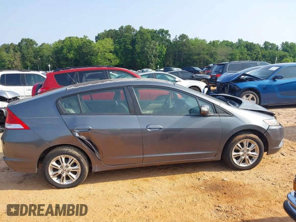 2010 Honda Insight EX with VIN JHMZE2H74AS027020, listed as a IAAI auction lot 42394875 with 248,003 mi miles and . Bid and sale history available at DreamBid. Image 13.