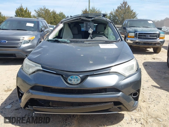 2016 Toyota RAV4 Hybrid Limited with VIN JTMDJREV7GD047729, listed as a IAAI auction lot 41833765 with 114,830 mi miles. Bid and sale history available at carsss.com. Image 12.